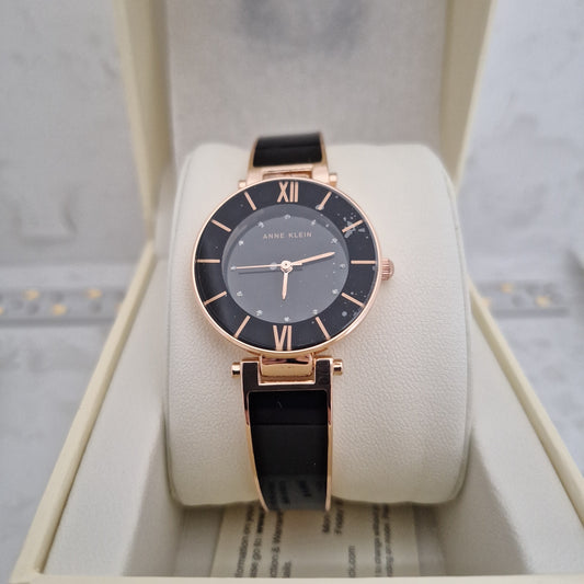 Anne klein Model AK/3956 Black glitter accented dial bangle women's watch