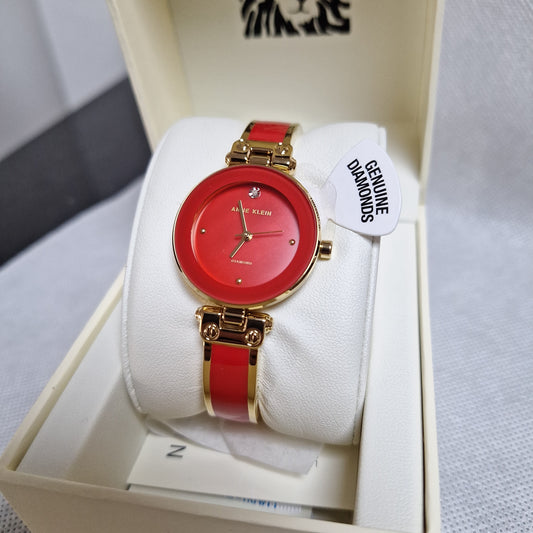 Anne Klein Women's Genuine Diamond Dial Bangle Watch. Red Bangle l AK/1980RDGB
