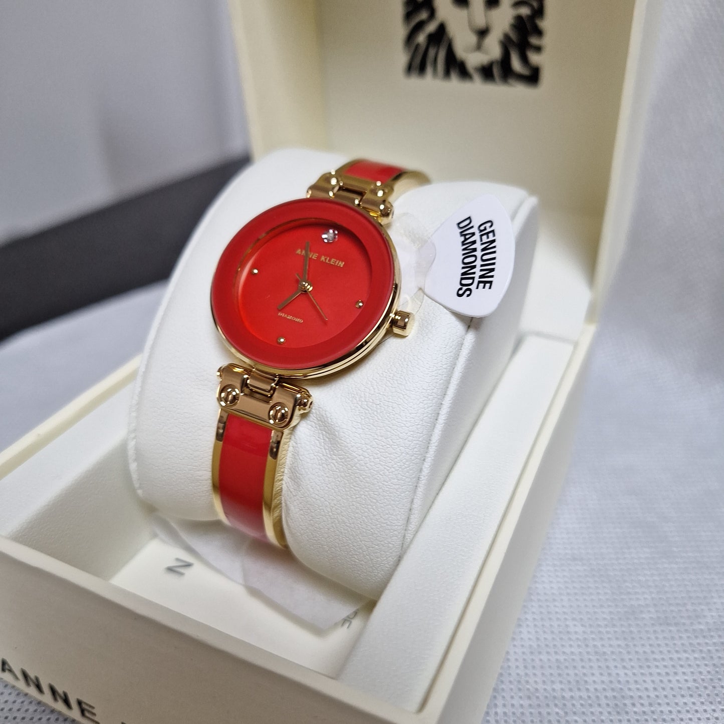 Anne Klein Women's Genuine Diamond Dial Bangle Watch.