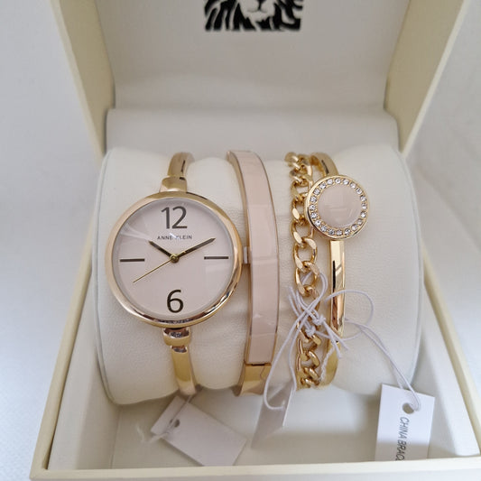 Anne Klein Women's Bangle Watch and Premium Crystal Accented Bracelet Set l AK/3290LPST