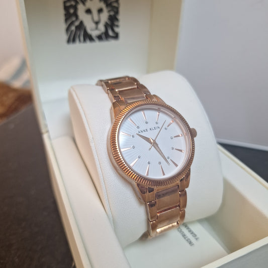 Anne Klein Womens Quartz Watch, Analog Display and Gold Stainless Steel Strap AK/3056WTRG l Authentic