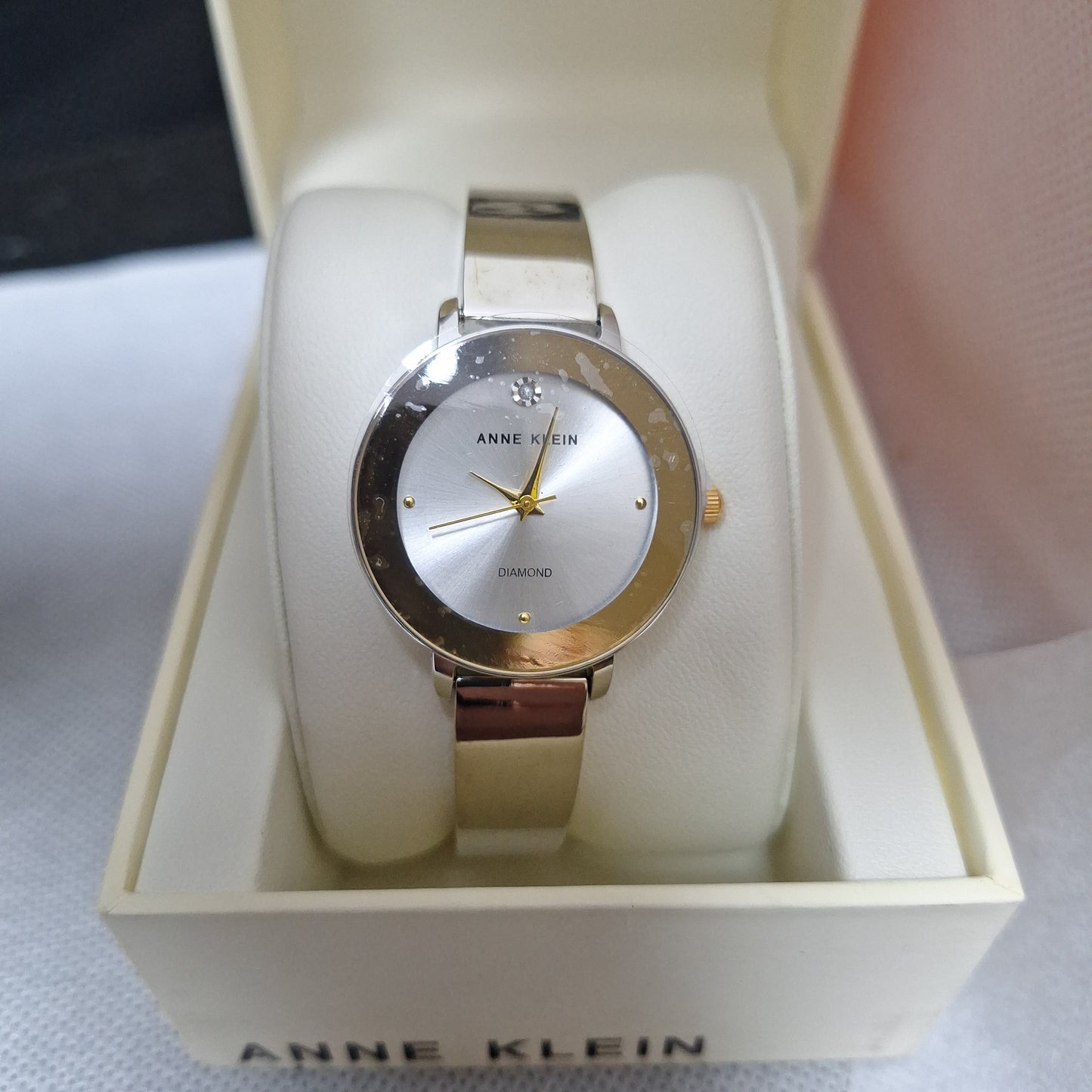 Anne Klein Women's Genuine Diamond Dial Bangle Watch,
