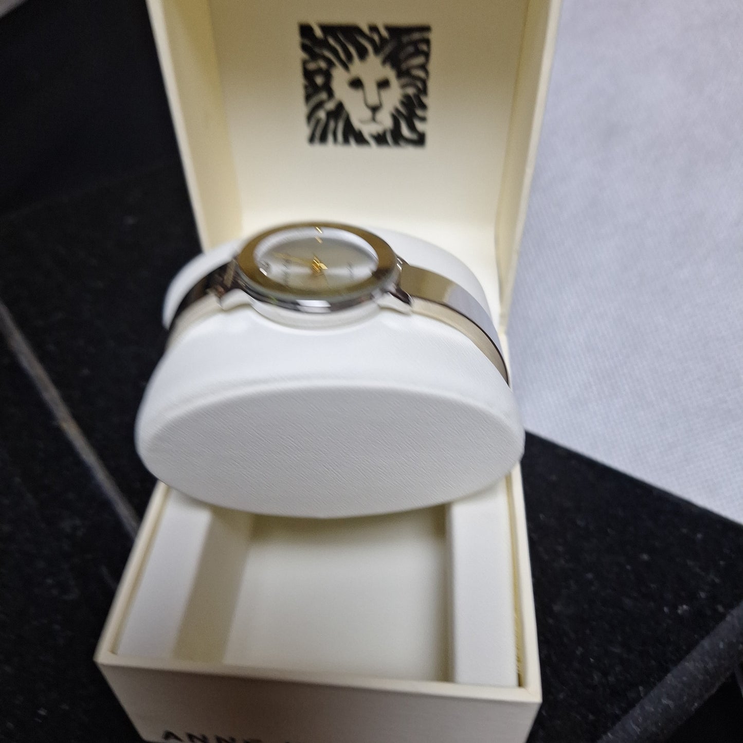 Anne Klein Women's Genuine Diamond Dial Bangle Watch,