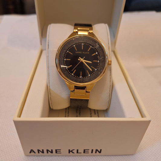 Anne Klein Women's Premium Crystal Accented Resin Bangle Watch, Black l AK/1408BKBK