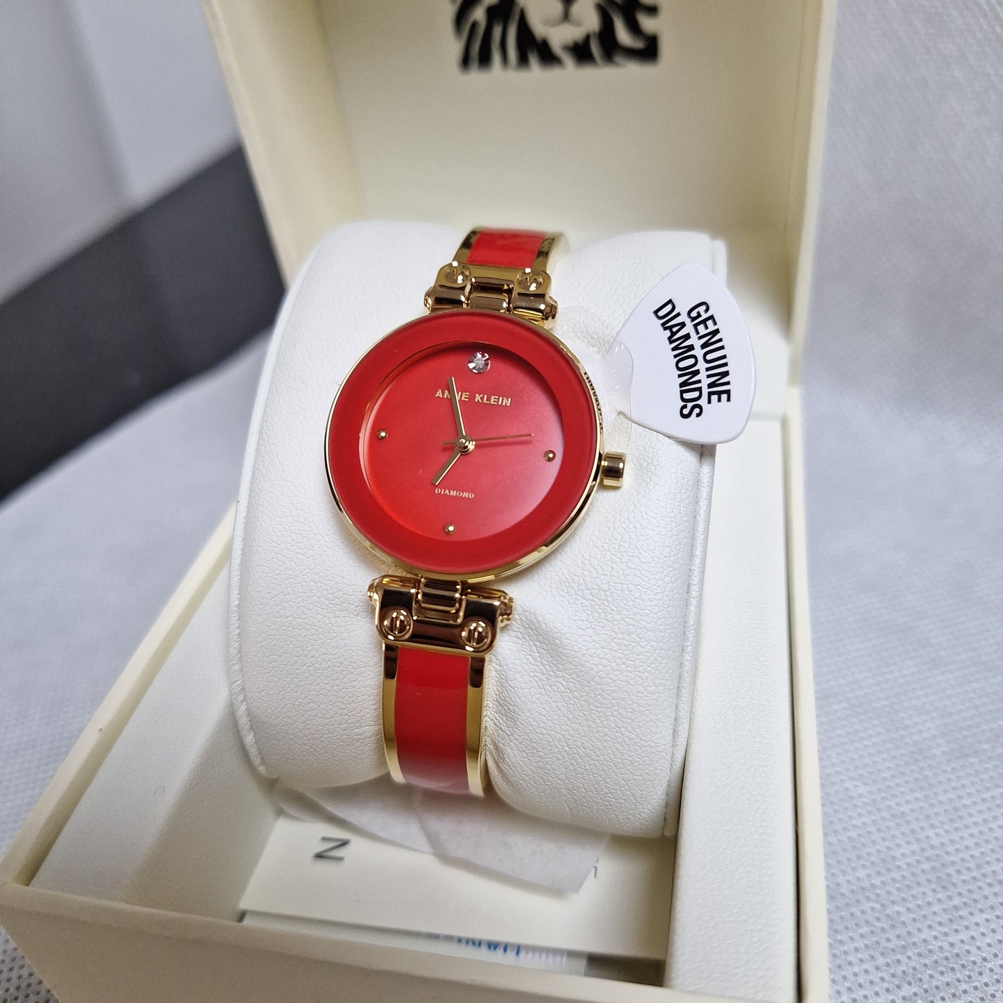 Anne Klein Women's Genuine Diamond Dial Bangle Watch.