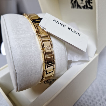 Anne Klein Women's Genuine Diamond Dial Bangle Watch.