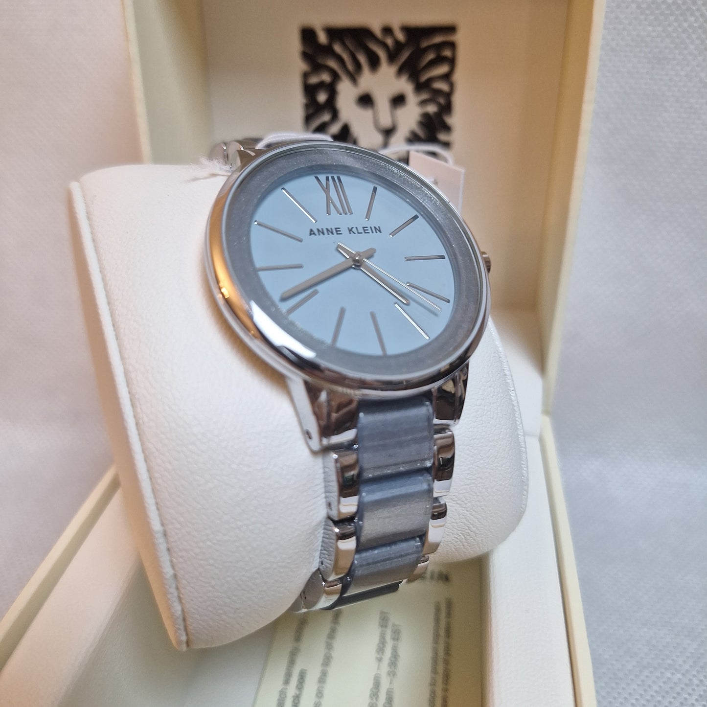 Anne Klein Women's Watch, Silver-tone adjustable link bracelet with light blue shimmer