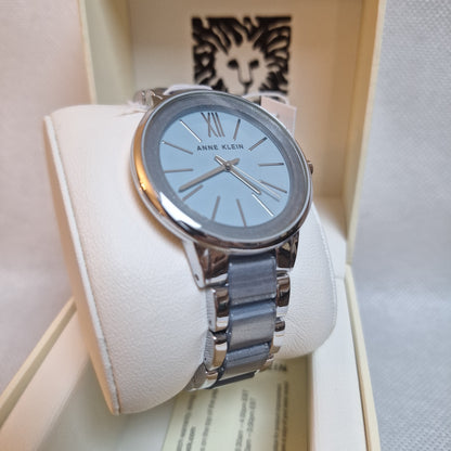 Anne Klein Women's Watch, Silver-tone adjustable link bracelet with light blue shimmer
