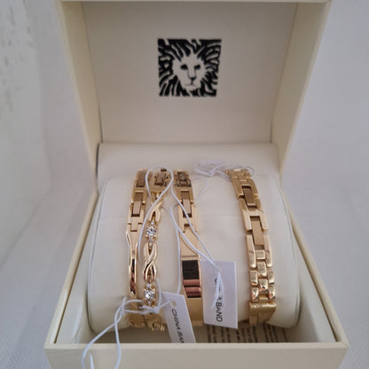 Anne Klein Women's Bangle Watch and Premium Crystal Accented Bracelet Set,