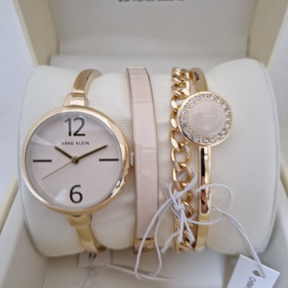 Anne Klein Women's Bangle Watch and Premium Crystal Accented Bracelet Set