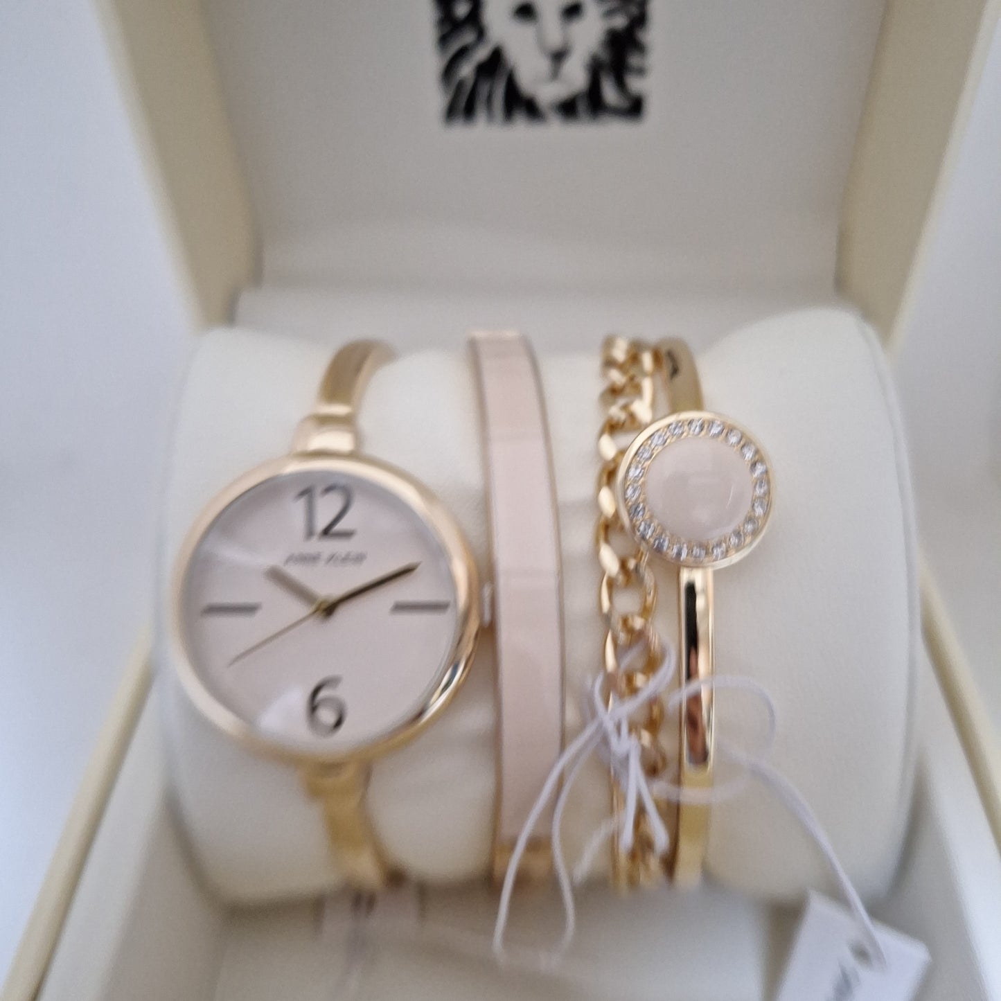 Anne Klein Women's Bangle Watch and Premium Crystal Accented Bracelet Set