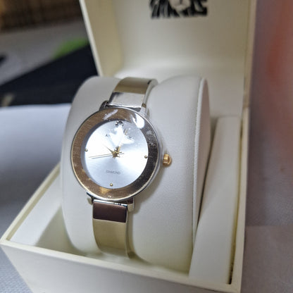 Anne Klein Women's Genuine Diamond Dial Bangle Watch,