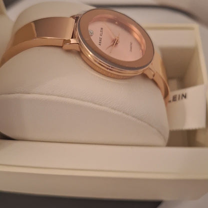Anne Klein Women's Genuine Diamond Dial Bangle Watch,