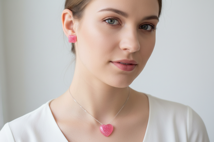 Pink heart earing stud with charm