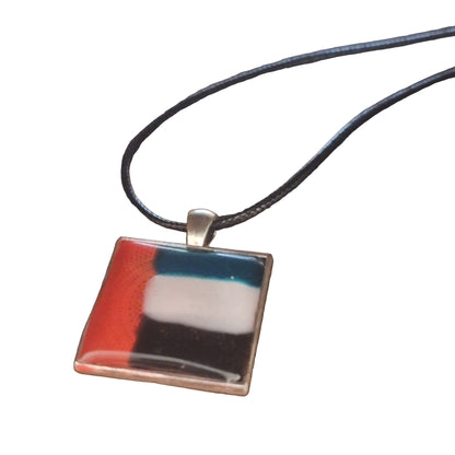 Necklace with a square pendant featuring inspired by UAE flag
